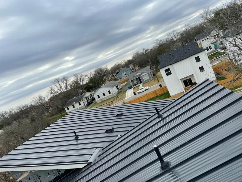 Standing seam metal roof panels with vents for Skylight Repair in Deschutes River Woods